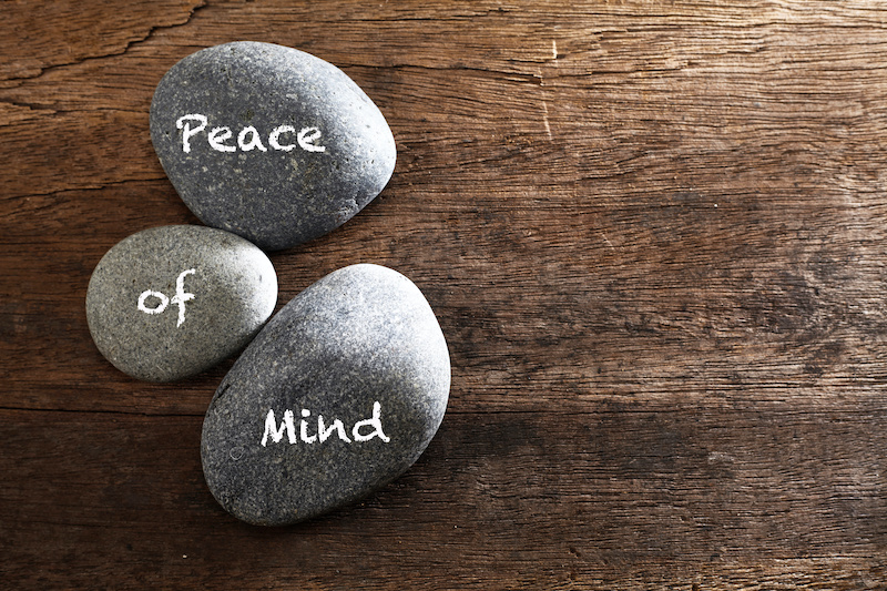 spa stone or pebble on the wooden background