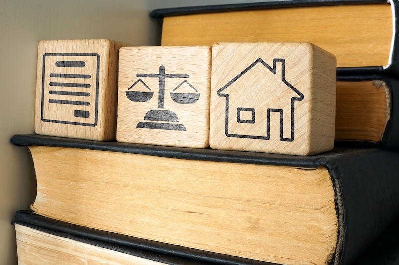 Book and symbol of court and real estate. Inheritance law and property rights.