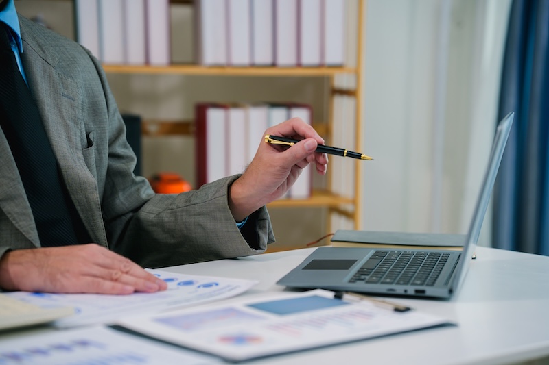 Using tablet pc, Consultant between bookkeepers and accounting lawyer consultation about asset, balance sheet, stock market statistics and yearly tax law, protect business from bribery.