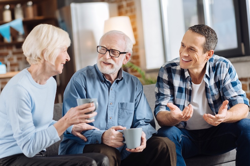 Enjoying themselves. Cheerful happy family consisting of elderly couple and their adult son sitting on the sofa, drinking tea and communicating with each other SSUCv3H4sIAAAAAAAEAJ1Wy46rOBDdjzT/ELFuJGP84n7F7Ed3YUw5sQIYYZNWz1X/+xR5NbHR9NWsEsqnXqfK5fr15x+HQ9Hq4Ezx4/Br/cJv1/dLiLOOzo8oJm93OXQu+tnpfhWuss/rSRGijkuAsJq4i4yOcETsTXjXf/j5+/Z9eBxcD1EDj4ribSMLS3uVPUSfb/9b8/bn5yMVfYTRfHzFtqqclhhhDtGb8zZIPKrqp6GfTy+F9dH3TqdYItQuvJtBDyG6AVINuotv3fEay3RCP4nKX+CnHna9wOSDi1elkGjRZk9D93r4SJC1EUIp3ZZWGlMyY0mphICyqSo8AUpaS75s3f58bjpihh70rSPuZgvJqDGKNmUrNJqUkpaqsrasWtlIbhuoW/0oYVFXABw6UYIlqmS2Qf9M2lIyZluKYNORJ1hT0zWNoCVtq65kVHVlC4yXArixVNVKcnkN9pZ0cX7HMg/bxnwHOMPYbUkolGKcFknbnPQ0vXBVCFIJnsImndV5Bco6BfbOQogffQrlJHMdkFIT3QUO1pslJAqCk8w2uLDMr5arWjGhUuS7diEelikNQub5+yQrLCMTKaqb3XhOk6cshelu6ePJ+1fehaT3cm2gVg+uT4ivlMhJ8uY2nl7JbPZxhwBmmV18NdzIpsoCwHEBz4H4TRA4W5IImMpaRB/deHyFcSWyQH2fsEPpni3IOBRV3kCj8/P3uAGHedI2Ky7rrxmim2GAMaYdUWeUtLr9OLQeu+c1AM4Ir/PyQN/BnNZ7L9YTaGwho9N4CafZXVtrDlmtKc+8uxHvjR7Nq02FkyTjYIIxYE/Ab9B6o6v7Da58MokEoU2G6v0lmy8iu2I7zBCWJRz9EeIpTYLUNEsCiw1z1G7Myk7XKLPJEvL7UmeFiaATEL49WSYnHRMUb/J8/XjBJ3znomI2Wd7GWwuQ+c7mmfHDsIzO7JmlSn4tHmtQ+XidAZUTRUmYEDK/o9e55P7JSsuzoCYs7bgzPitFMlpu2PA9MOr+/D3LdklYwAmXTczOBXymwn8WYv25bwwX14HfLJB66ZzfPNEXb3S/ZlBvlKbZmdsYfaj5ex8/91BcZP2wEYw+XteS+7pYdLiorp9VjRw3vKISLxtjkqvisdziDua67XLrVsoLZnQFRuKeQagtGdQdLjSclo1ghIGiumnXRD//Be6J4LJkCwAA