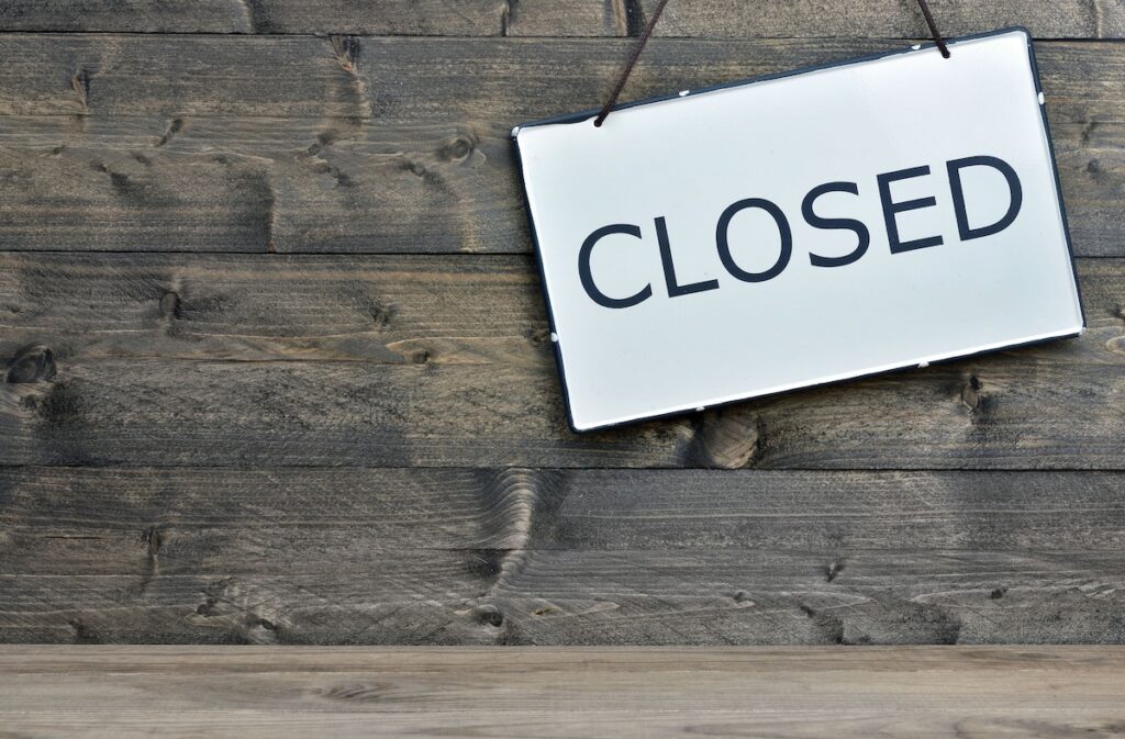 Closed message on wooden table