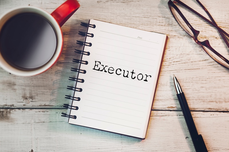 board with word executor written in chalk