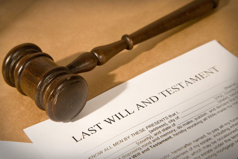 Judge's gavel resting on a Last Will and Testament